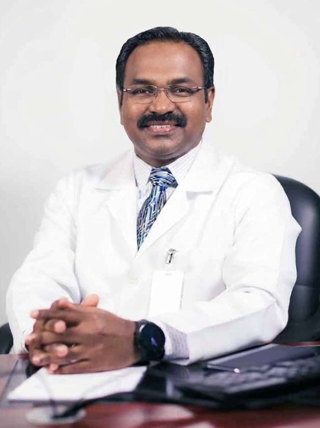 Dr. Newton Edward Dhas